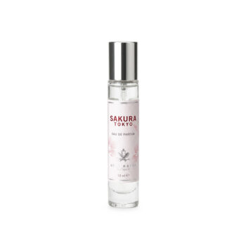 Perfume bottle with a silver cap, label reads SAKURA TOKYO Eau de Parfum, pink floral design, 15 ml