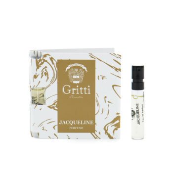 Perfume box with a gold panel reading 'Gritti Jacqueline' and a small spray bottle beside it.