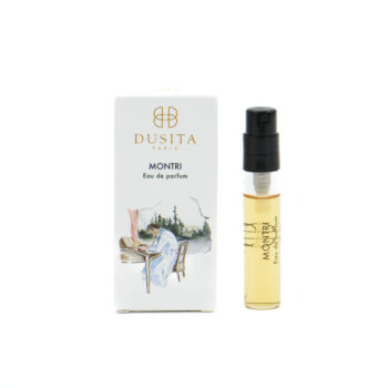 Dusita Montri Eau de parfum bottle beside its white box with a drawing of a person at a desk outdoors.
