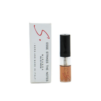 Small perfume bottle with black cap beside a white box labeled Esse Strikes The Notes, Miranda eau de parfum image.