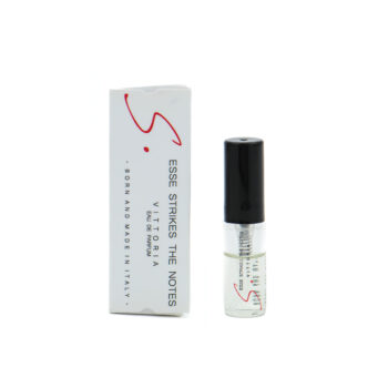 Small perfume vial with black cap beside its white box on a white background, product display