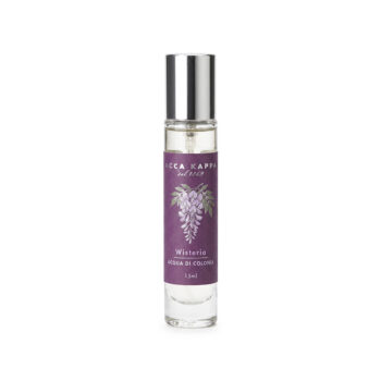 Perfume bottle with a silver cap and a purple label that reads 'Wisteria' and 'Acqua di Colonia' (15 ml).